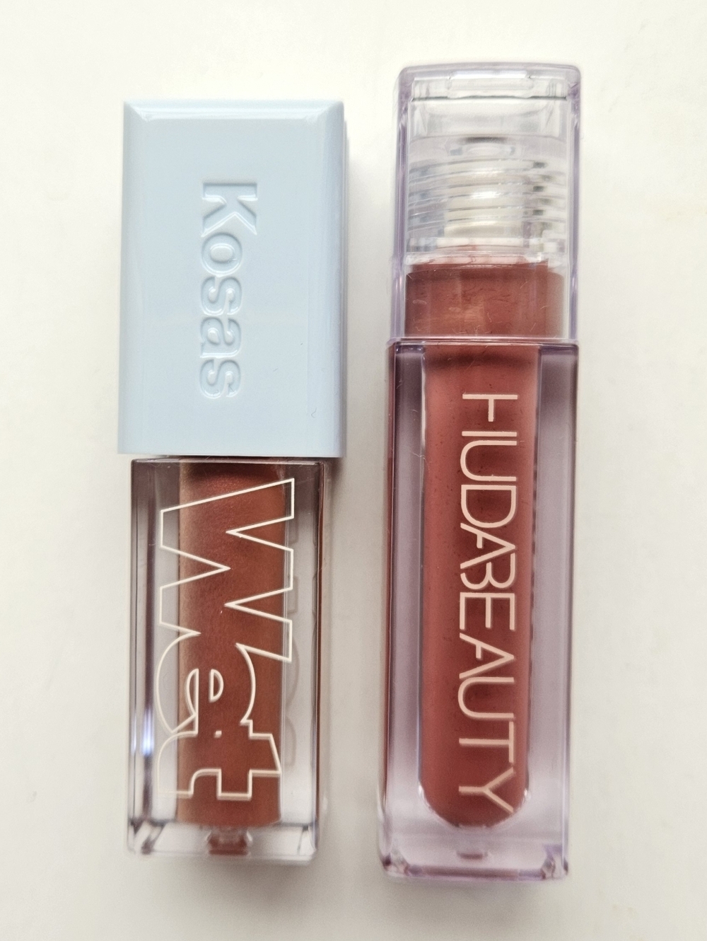 x2 NWT Huda Beauty Lip Gloss Kosas Wet Lip Oil Bombshell Lip Oil Treatment Pinky